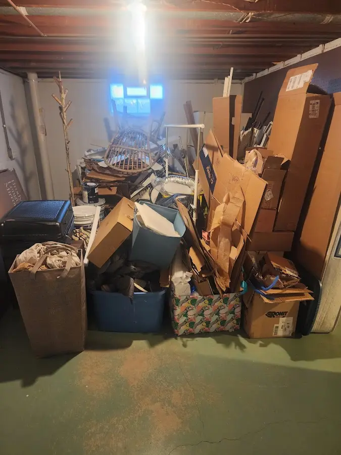 Roll-off dumpster container at job site for Yard Waste Dumpster Rental in Suncoast Estates